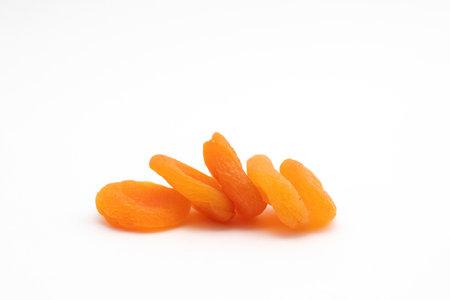 dried apricots fruit on white background.の写真素材
