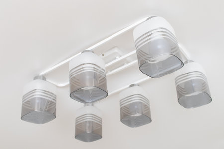 Chandelier with LED lamps on the ceilingの写真素材