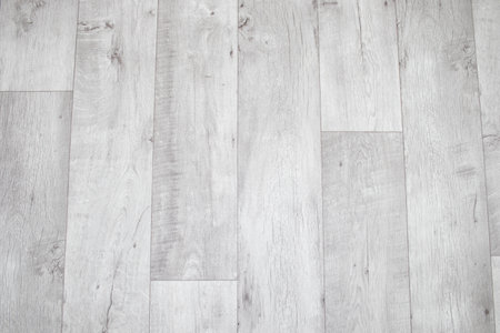 White linoleum with a wood texture. Types of floor coverings.の写真素材
