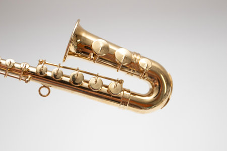 Model of miniature saxophone model on white backgroundの写真素材