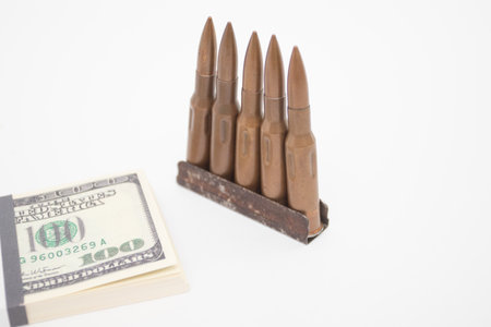 US dollar pack with weapons.