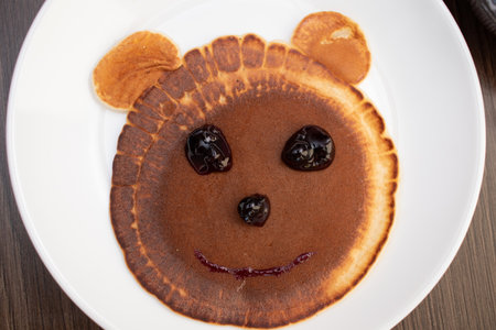 Pancakes With Funny Faces. Idea for kids breakfast.の写真素材