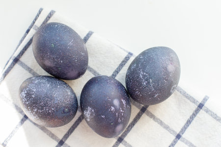 easter eggs on a checkered towel.の写真素材