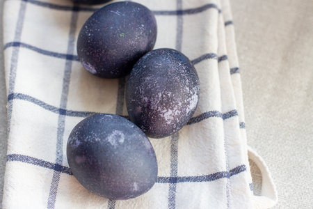Dyed blue and marble easter eggs coolored hibiscus and carcadeの写真素材