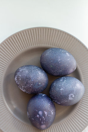 easter eggs on a gray plateの写真素材