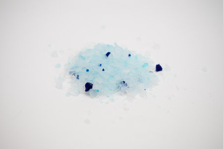 Blue Methamphetamine on white background.の写真素材