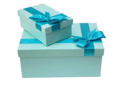 Blue gift boxes with a bow on a white background