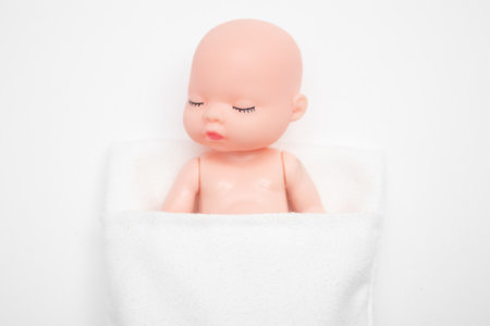 the little doll baby is sleepingの写真素材