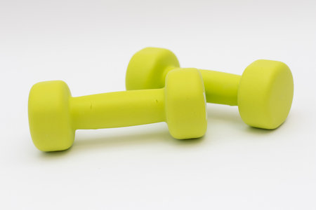 Green dumbbells 1 kg. isolated on white background.の写真素材