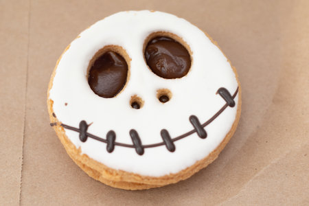 ghost cookies for Halloween on paper backgroundの写真素材