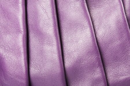 Background of a violet leather close upの写真素材