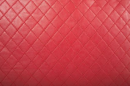 Background from a   red leather close upの写真素材