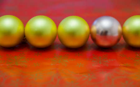 Christmas Balls Christmas-Tree Decorations on a Red Backgroundの写真素材