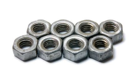 Eight screw nuts in two rows isolated on white background. Front Top Down View.