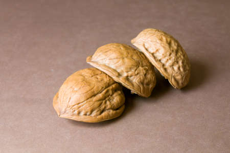 Walnut shells closeup on each otherの写真素材