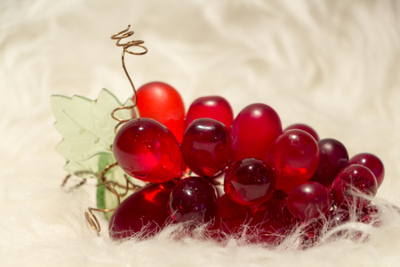 Bunch of grapes from red glass, glass articlの写真素材