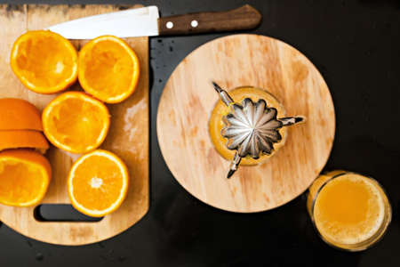 freshly squeezed orange juice from the glassの写真素材