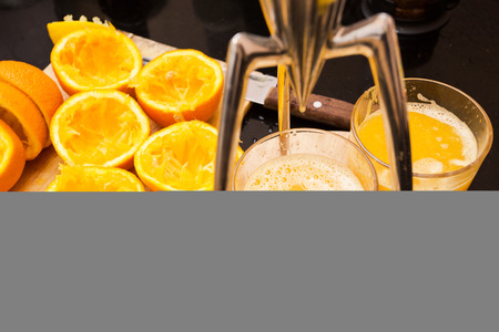 freshly squeezed orange juice from the glassの写真素材