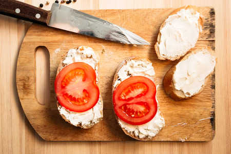 Delicious sandwiches with fresh tomatoes and cheeseの写真素材