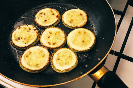 Fried zucchini slices prepared on a pan
