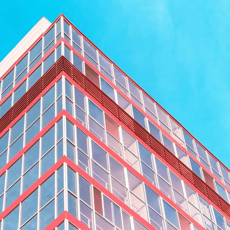 The tip of a modern building against the skyの写真素材