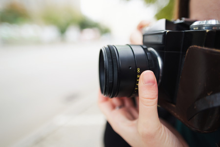 vintage old camera. photographing on the streetの写真素材