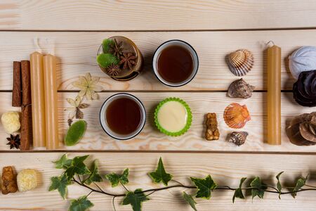 Various confectionery on a light wooden background.の写真素材