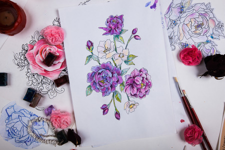 The creative table of the artist drawing sketches.の写真素材
