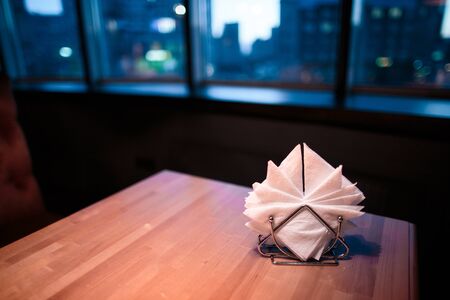Evening cozy table in a good cafe.の写真素材