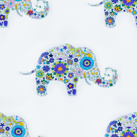 Seamless pattern of an elephant in flowers on a white background.の写真素材