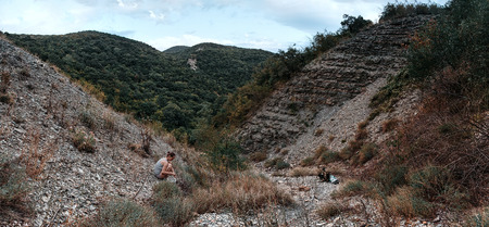 Preparation of evening dinner at stake. Camp kitchen in a mountains by the sea.の写真素材