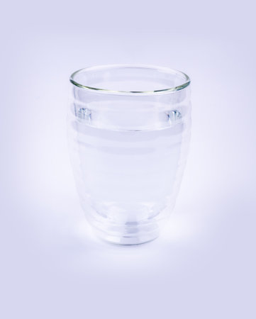 Transparent drinking glass with clean water on white background. High quality photoの写真素材