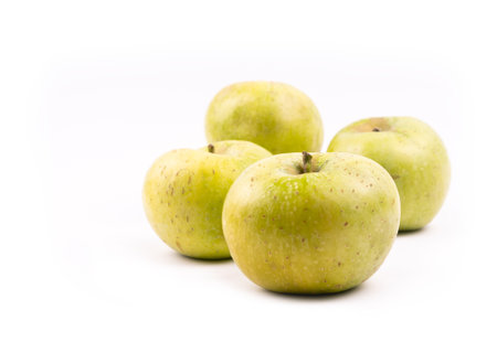 Green Apple - Fresh Ripe fruits with blurry depth of field, isolated on a white background, fruit healthy concept. High quality photoの写真素材