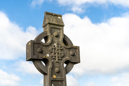 Old Irish traditional Celtic cross with relief ornamentの写真素材