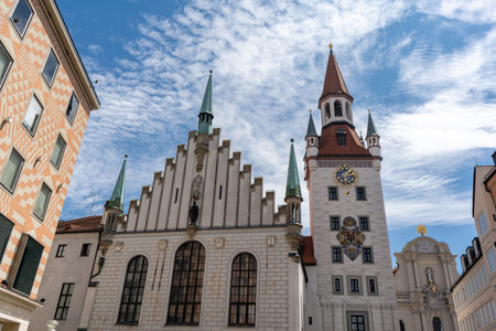 Munich, Germany. Old Town Hall building or Altes Rathaus. in German. Prominent clock tower, intricate carvings, and beautiful arched windows, making it a popular landmark and a must-see for visitorsの写真素材