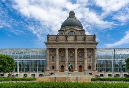 Building of the Theatermuseum Clara Ziegler Stiftung in Munich elegant example of historic architecture. Grand structure featuring ornate details, arched windows, and a stately facade.の写真素材