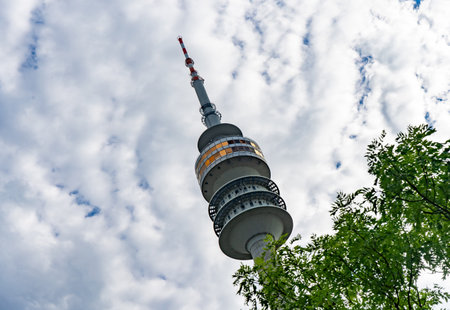 Olympic Tower or Olympiaturm, Munich, Germany. Tension roof on blue sky background. This place is tourist attraction of Munich cityの写真素材