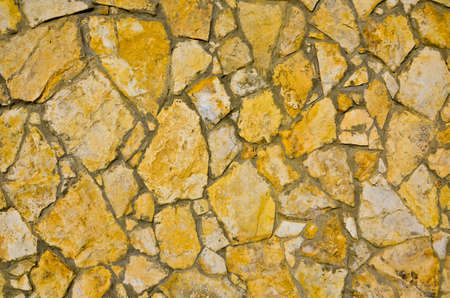 Photo broken stone a cement on the wallの写真素材