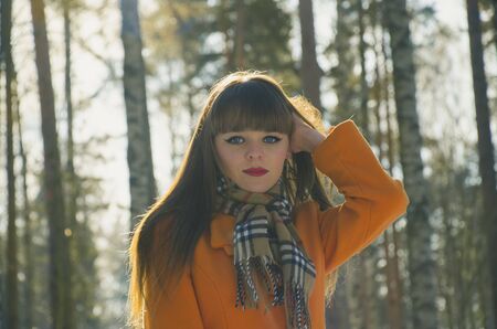 girl walking in the forest oneの写真素材