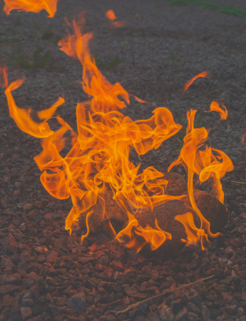 the stones are burning bright with fire, close-up.の写真素材