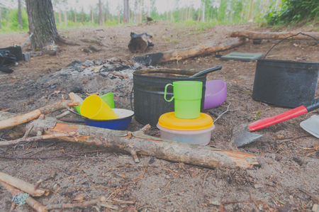 Hiking utensils near the fire.の写真素材