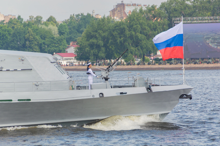 Russia, Saint-Petersburg, July 30, 2017 - the machine gunner on the bow of the ship.のeditorial素材