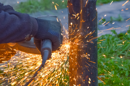 worker hand tools saws off screw piles in size