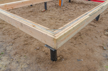 the angle of the boards, the timber framing of a house under constructionの写真素材
