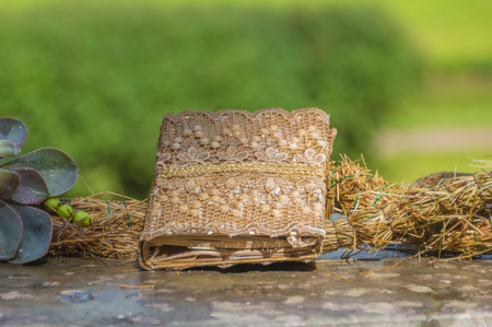 close-up fairytale book lying on the stone