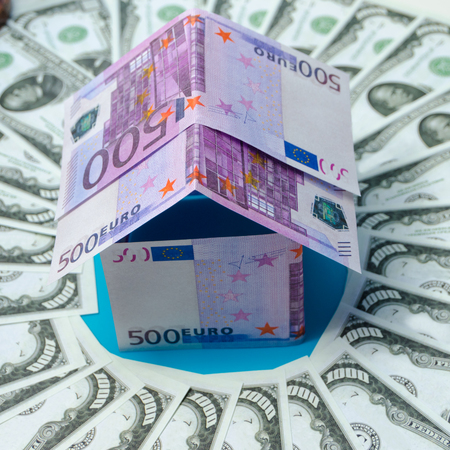 in the circle the dollar, a house made of Euro banknotesの写真素材