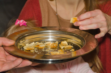 communion in the Church, she takes the bread