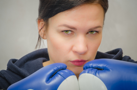 slim, sporty girl in Boxing glovesの写真素材