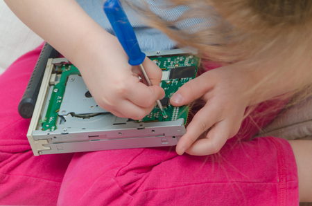 baby girl, baby computer repair, system block screwdriverの写真素材