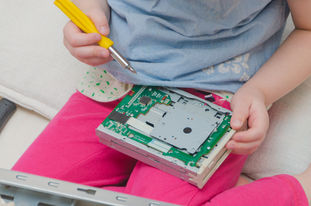 baby girl, baby computer repair, system block screwdriverの写真素材